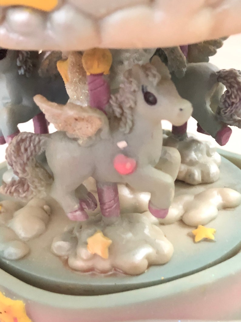 The Unicorn Revolving Musical Horse Carousel